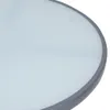 A close-up view of the edge of a round table. Produktbild-Vorschau