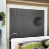 A bedroom scene with a headboard, pillows, and a decorative wall panel. Produktbild-Vorschau