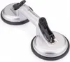 A product shot of a dual suction cup lifter on a white background. Produktbild-Vorschau
