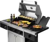 A stainless steel gas grill with food cooking on it, set against a white background. Produktbild-Vorschau