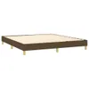 A brown fabric box spring bed frame with wooden legs, shown from a side angle against a white background. Podgląd zdjęcia produktu