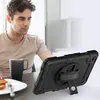 A man is sitting at a table with a tablet in a protective case. Produktbild-Vorschau
