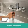 A hand is shown attaching a shower hose to a faucet. Anteprima dell’immagine prodotto