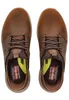 A top-down view of a pair of brown Skechers Slip-Ins shoes. Voir les images du produit