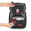 Hands are shown attaching decorative dragon charms to a backpack. Náhľad obrázku produktu