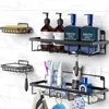 Bathroom shelves with various toiletries and accessories mounted on a tiled wall. Náhled obrázku produktu