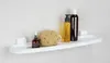 A bathroom shelf with toiletries on it. Náhled obrázku produktu