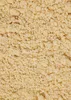 A close-up, textured view of a light brown, granular substance, likely a food product. Produktbild-Vorschau