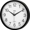 A black and white analog wall clock with a black frame and a white face, displaying numbers and hands. Anteprima dell’immagine prodotto
