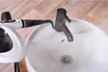 A steam cleaner is being used to clean a sink. Podgląd zdjęcia produktu
