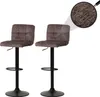Two brown bar stools are shown against a white background. A magnified view of the fabric texture is shown in the upper right corner. Podgląd zdjęcia produktu