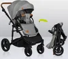 A stroller shown in its unfolded and folded states, with a green arrow indicating the folding action. Anteprima dell’immagine prodotto