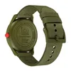 The back of a green watch with a fabric strap. Voir les images du produit