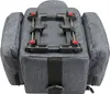A close-up, top-down view of a gray bicycle pannier bag with a black mounting system attached to the top. Podgląd zdjęcia produktu