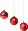 Three red Christmas ornaments hang from gold strings against a white background. Náhled obrázku produktu
