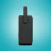 A side view of a black portable speaker with a handle, set against a bright blue background. Produktbild-Vorschau