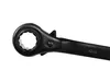 A close-up shot of a black ratchet wrench with a double nut. Produktbild-Vorschau