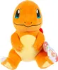 A plush toy of the Pokemon Charmander is sitting and facing the camera. Voir les images du produit