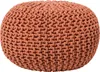 A round, knitted pouf in a copper color. Produktbild-Vorschau