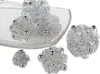 Several decorative wire balls with silver beads are arranged on a clear glass dish filled with small clear beads, with some balls outside the dish. Produktbild-Vorschau