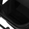A close-up view of the interior of a black stroller basket with a zipper. Produktbild-Vorschau