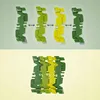 A top view of a dinosaur race track set, showing individual track pieces and then assembled track. Produktbild-Vorschau