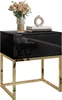 A black high-gloss nightstand with a gold-plated frame, decorated with a vase of flowers and books. Náhled obrázku produktu