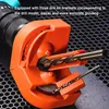 A close-up view of a drill bit sharpener attachment for a power drill, with drill bits inserted. Podgląd zdjęcia produktu