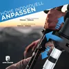 A person's hand is holding a trekking pole with a scenic mountain background. Produktbild-Vorschau