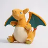A plush toy of a dragon-like creature, likely a Pokemon, is sitting against a plain white background. Produktbild-Vorschau