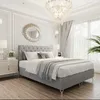 A luxurious bedroom with a large bed, elegant decor, and soft lighting. Produktbild-Vorschau