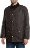 A man wearing a brown waxed jacket. Produktbild-Vorschau