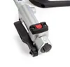 A close-up view of a tool's mechanism, showing a lever and a red button. Náhled obrázku produktu