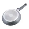 The underside of a frying pan with a handle is shown against a white background. Náhľad obrázku produktu
