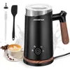A black electric milk frother with a wood-grain handle, shown with accessories and a cup of latte art coffee. Produktbild-Vorschau