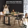 A dining table set for a festive occasion, with a Christmas tree in the background and a snowy window view. Anteprima dell’immagine prodotto