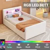 A modern white LED bed with pillows and a blanket, set in a room with soft lighting. Produktbild-Vorschau