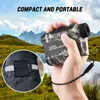 A hand holds a camouflage laser rangefinder in front of a scenic landscape with mountains and a lake. A small inset shows a pouch attached to a belt. Produktbild-Vorschau