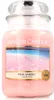 A large Yankee Candle jar with a label depicting a beach scene. Podgląd zdjęcia produktu