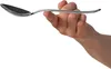 A hand holding a spoon. Produktbild-Vorschau