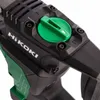 A close-up view of the top section of a power tool, showing the brand name and a green dial. Produktbild-Vorschau