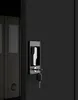 Close-up view of a filing cabinet lock and keys, with two binders visible inside. Voir les images du produit