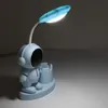 Nabíjecí stolní lampa v designu astronauta s držákem na Náhled obrázku produktu 7