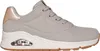 A side view of a gray Skechers sneaker with a white sole and a brown outsole. Produktbild-Vorschau