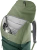 A close-up view of the inside of a green backpack, showing a water bottle and internal pockets. Produktbild-Vorschau