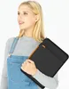 A young woman is holding a black laptop sleeve. Anteprima dell’immagine prodotto