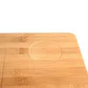 A close-up view of a bamboo surface with a circular indentation. Produktbild-Vorschau