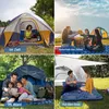 Collage of four scenes showing people using inflatable sleeping mats in different outdoor settings: inside a tent, outside a tent by a lake, in a forest, and on grass under a canopy. Produktbild-Vorschau