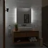 A modern bathroom vanity with a sink, mirror, and LED lighting. Produktbild-Vorschau