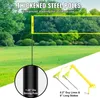 A diagram illustrating the features of a volleyball net set, with a background of a grassy field and trees. Produktbild-Vorschau